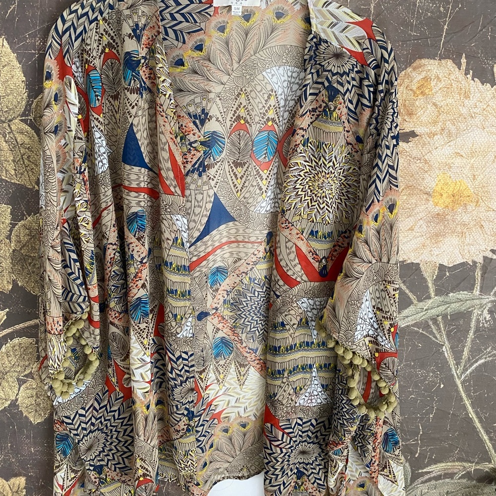 Open light blouse with pattern
